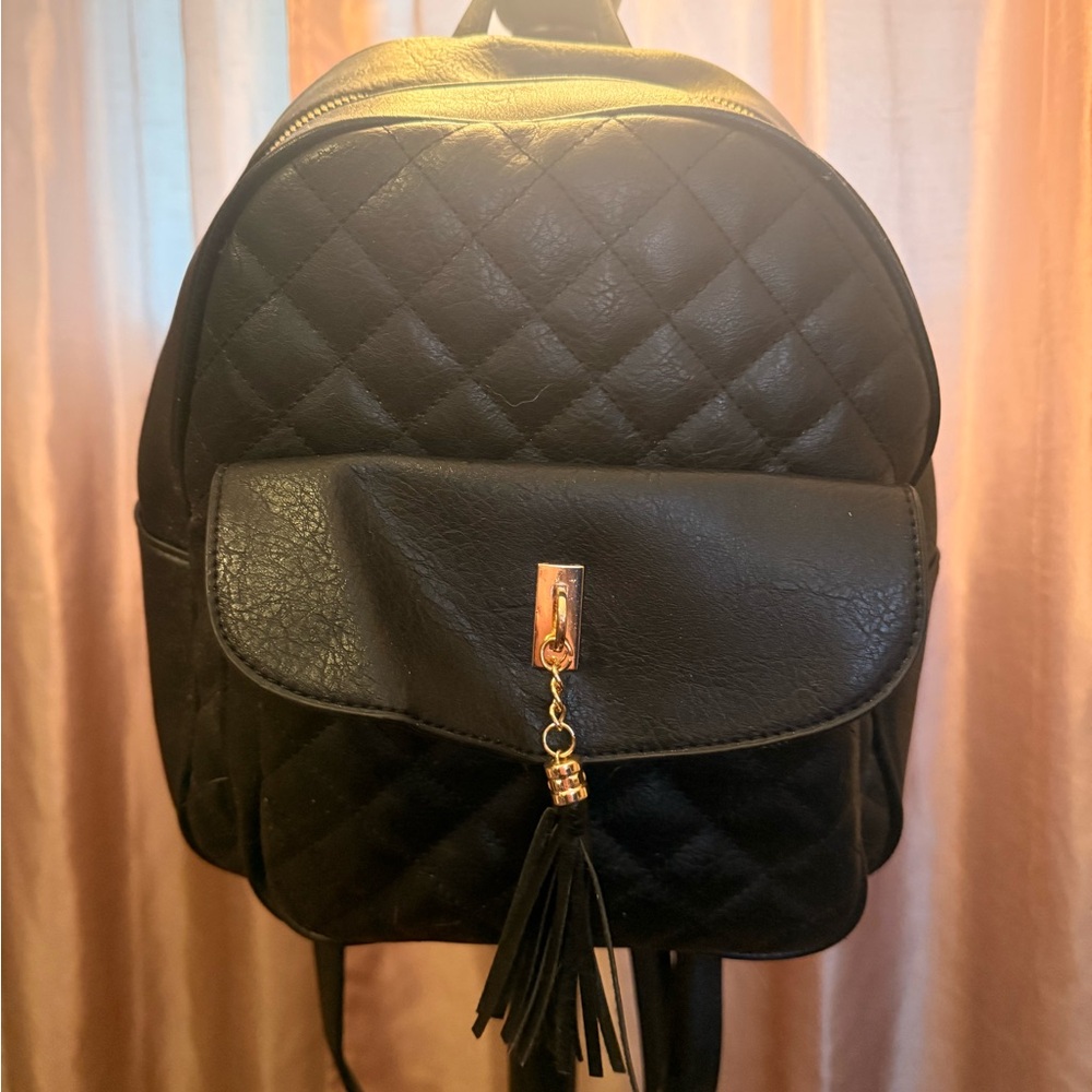 Black Quilted Backpack with Tassel